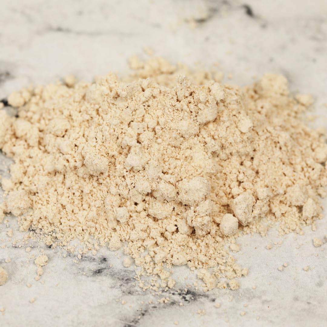 Dirty Treasures bath dissolving oats releasing soothing colloidal oatmeal into water.