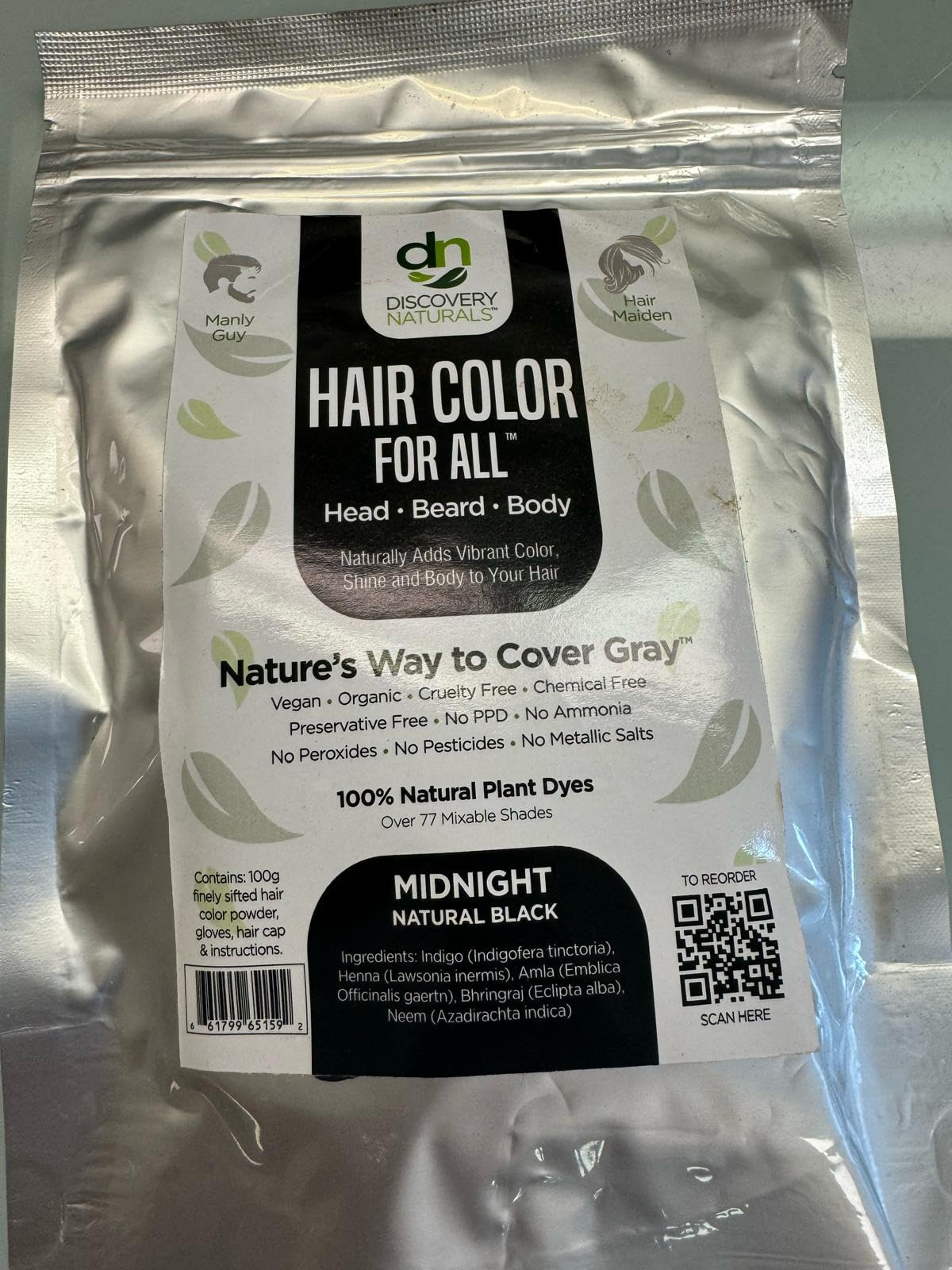 Discovery Naturals Henna color result close-up reveals deep midnight tones