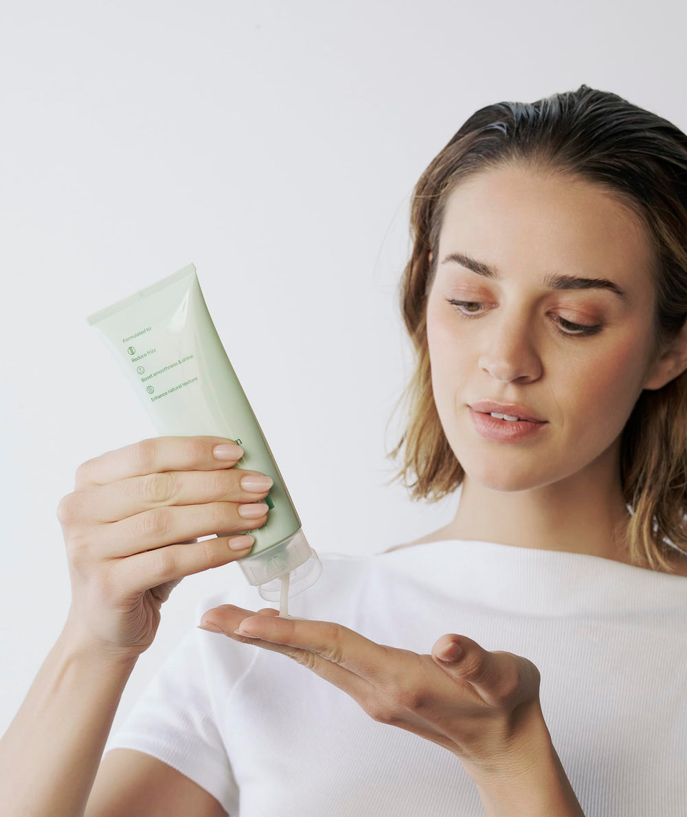 Divi Air Dry Styling Cream defining strands for natural texture.