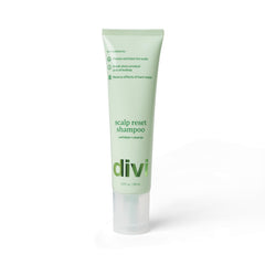 Divi Clarifying Scalp Reset Shampoo bottle being poured for a weekly deep cleanse