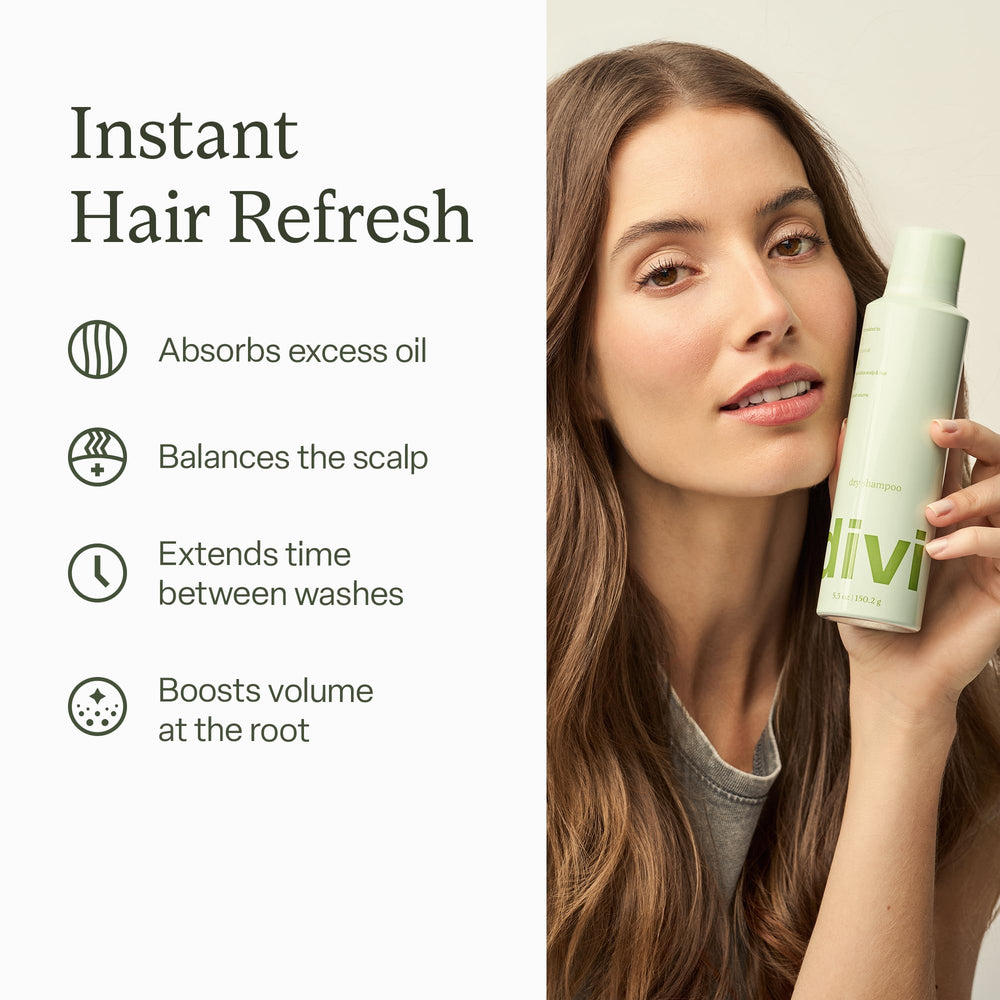 Divi dry shampoo being misted for even coverage and refresh