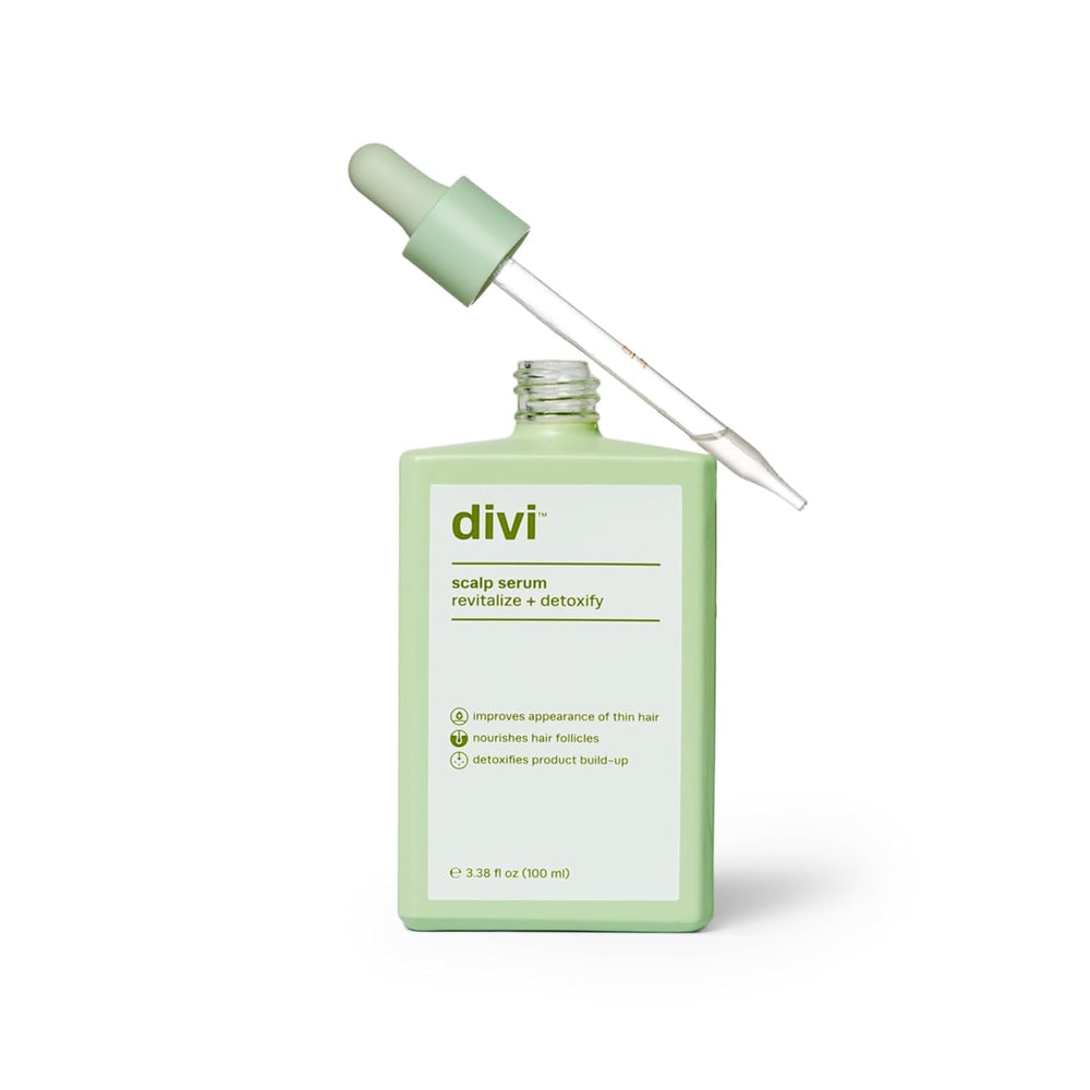 Divi hair serum bottle front view showcases premium formula for scalp care.