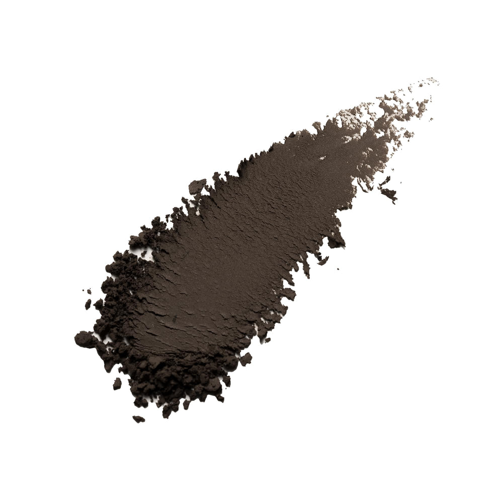 Divi Root Touch-Up Powder swatch in dark brown blends seamlessly with hair color