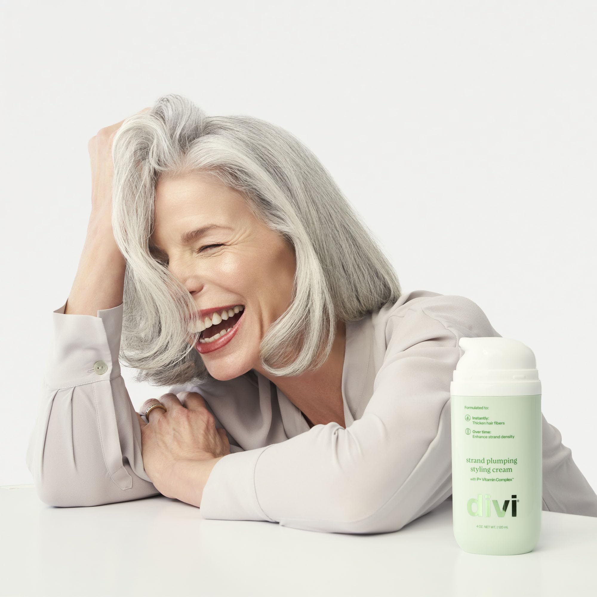 divi Strand Styling Cream model hair shows lifted voluminous style