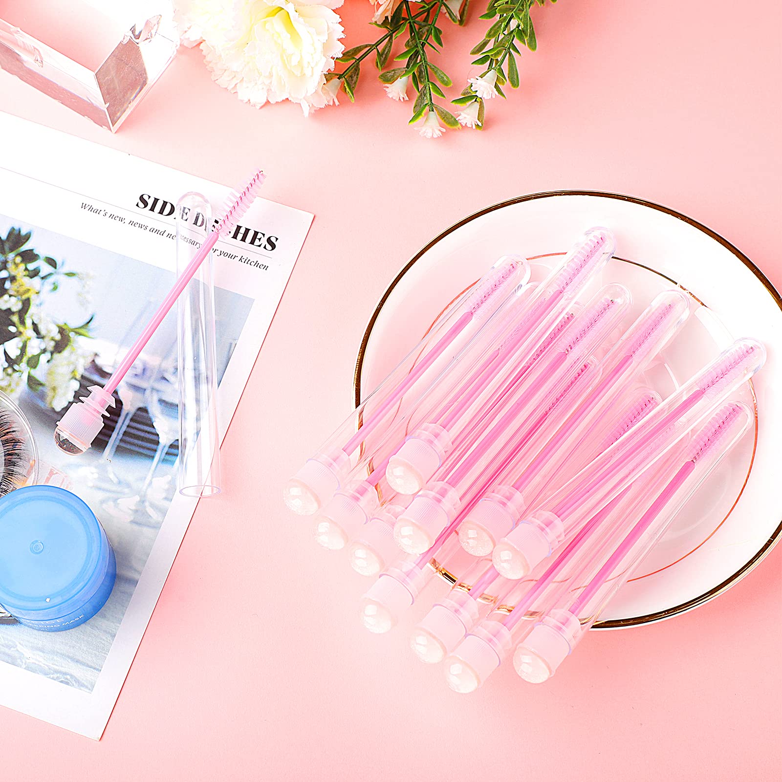 Dming mascara wand in decorative packaging for display