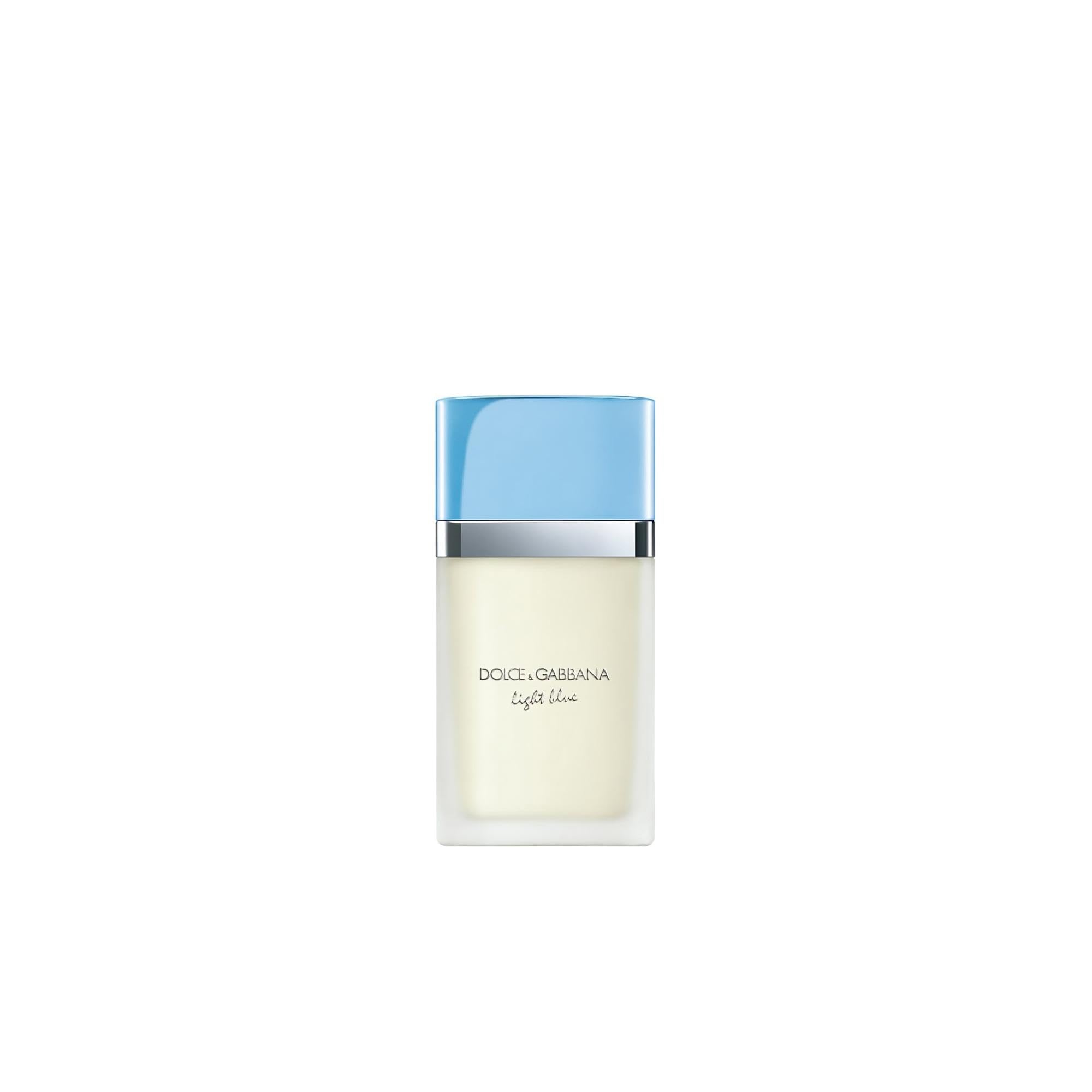 Dolce&Gabbana Light Blue bottle on a sunlit beach, ideal for daytime wear