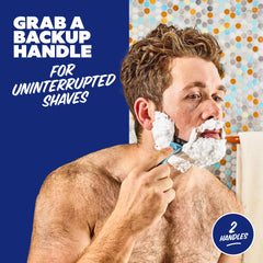 Dollar Shave Club blue handle compatible with 4- and 6-blade cartridges.