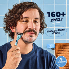 Dollar Shave Club precision-trimmer blade close-up for detailing hard-to-reach areas.