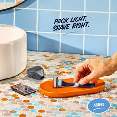 Travel Shave Set contents including blades, handle, and cover.