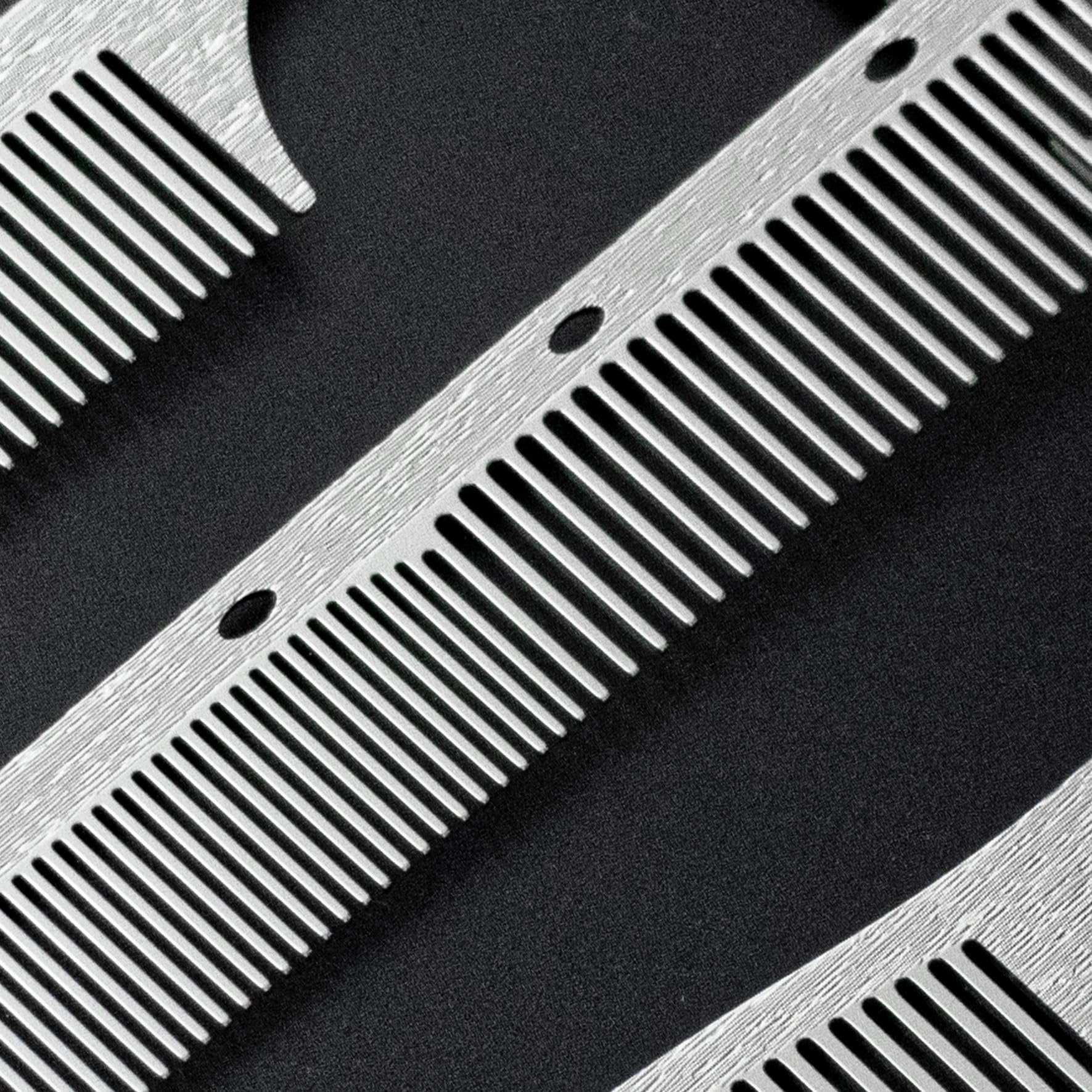 Dolmifapro ultra-thin portable comb fits bags for on-the-go styling.