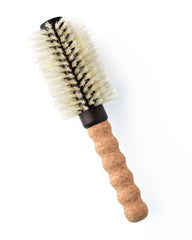 Dom Dom cork-handle round brush eases styling with lightweight grip and reduced wrist fatigue.