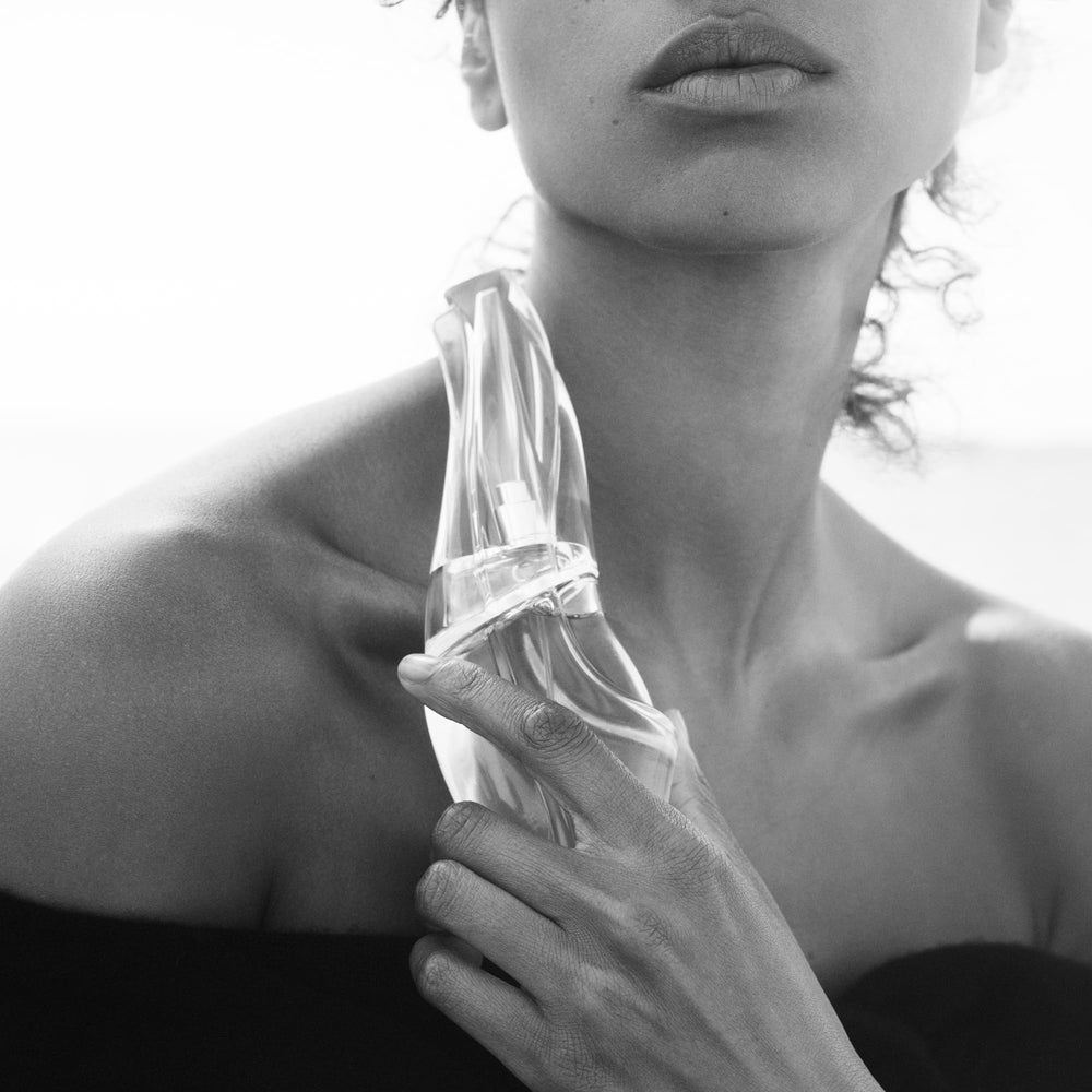 Donna Karan Cashmere Mist deodorant application underarms for lasting freshness