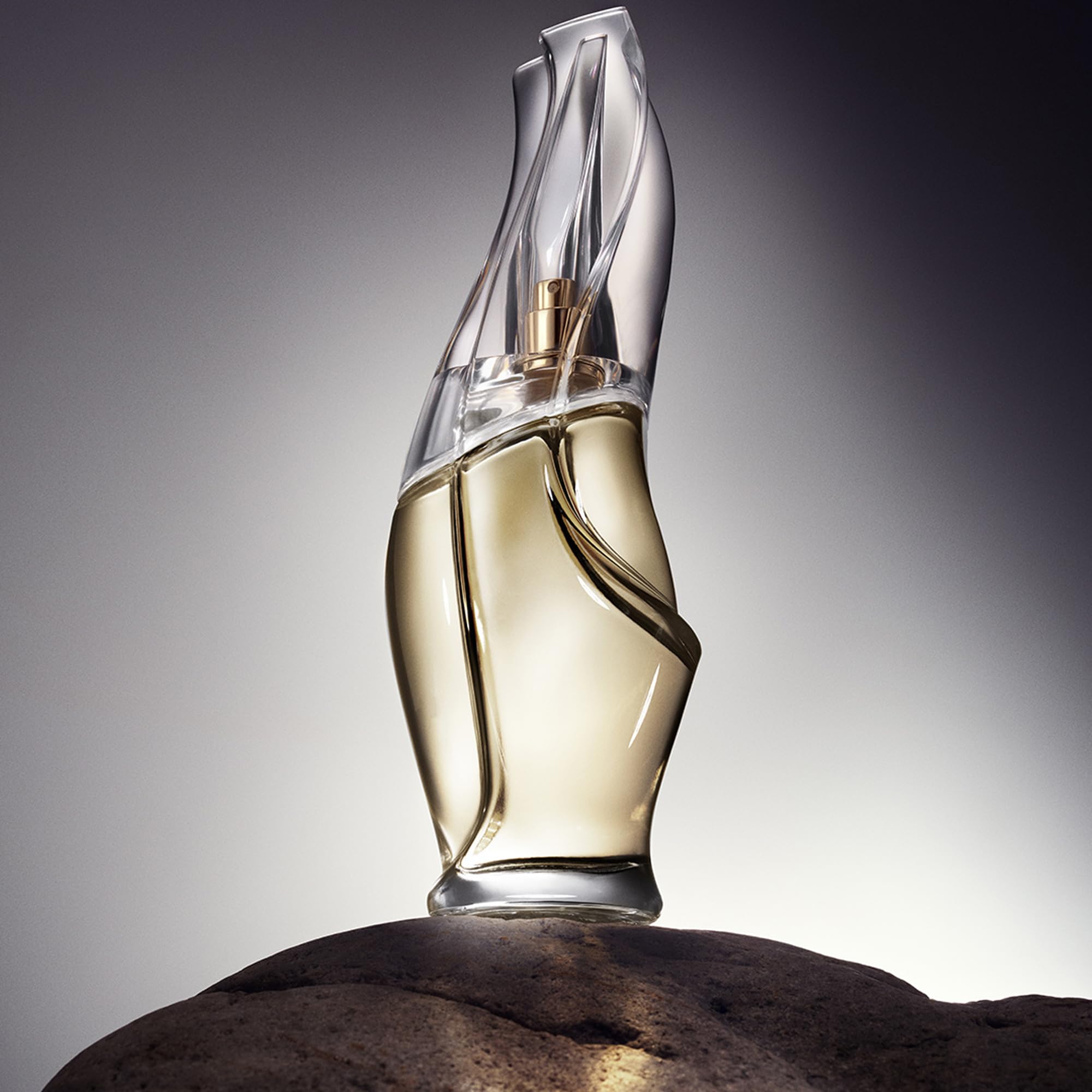 Donna Karan Cashmere Mist embossed label emphasizing refined branding