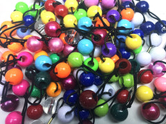 Dossini assorted elastic ponytail holders for secure daily wear and color coordination.