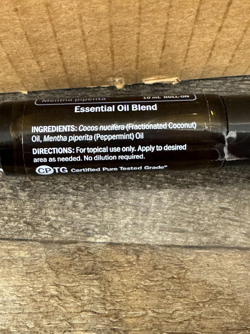 doTERRA Peppermint Touch cap-off showing easy application.
