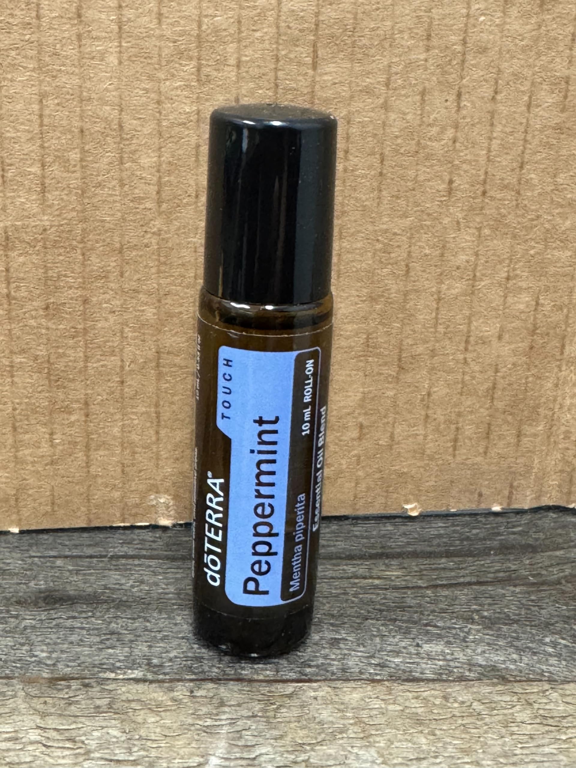 doTERRA Peppermint Touch roll-on in use for quick cool-down.