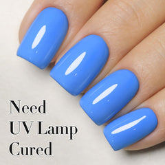 Double Rhythm blue sheer swatch on nail showing natural, everyday wear.