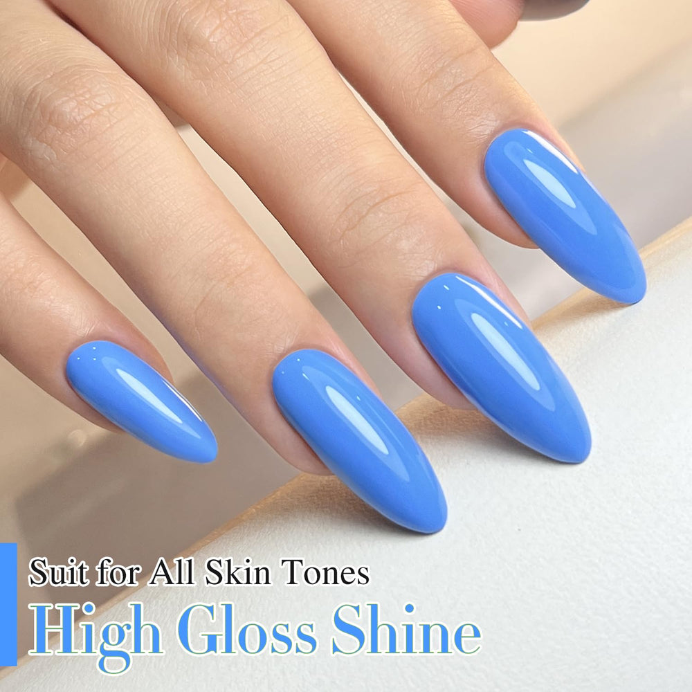 Double Rhythm finished blue sheer manicure with high-gloss shine.