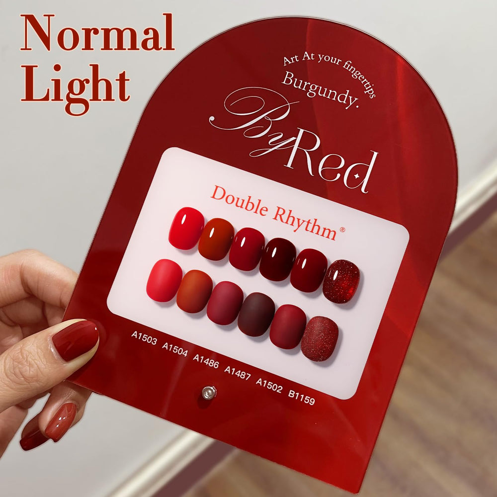 Double Rhythm glitter burgundy nail-art setup demonstrates creative DIY manicure possibilities