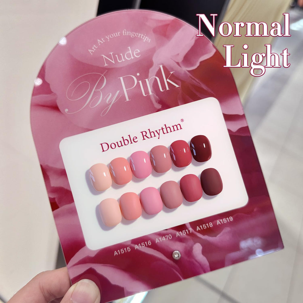 Double Rhythm pink gel polish bottle for chic everyday nails.