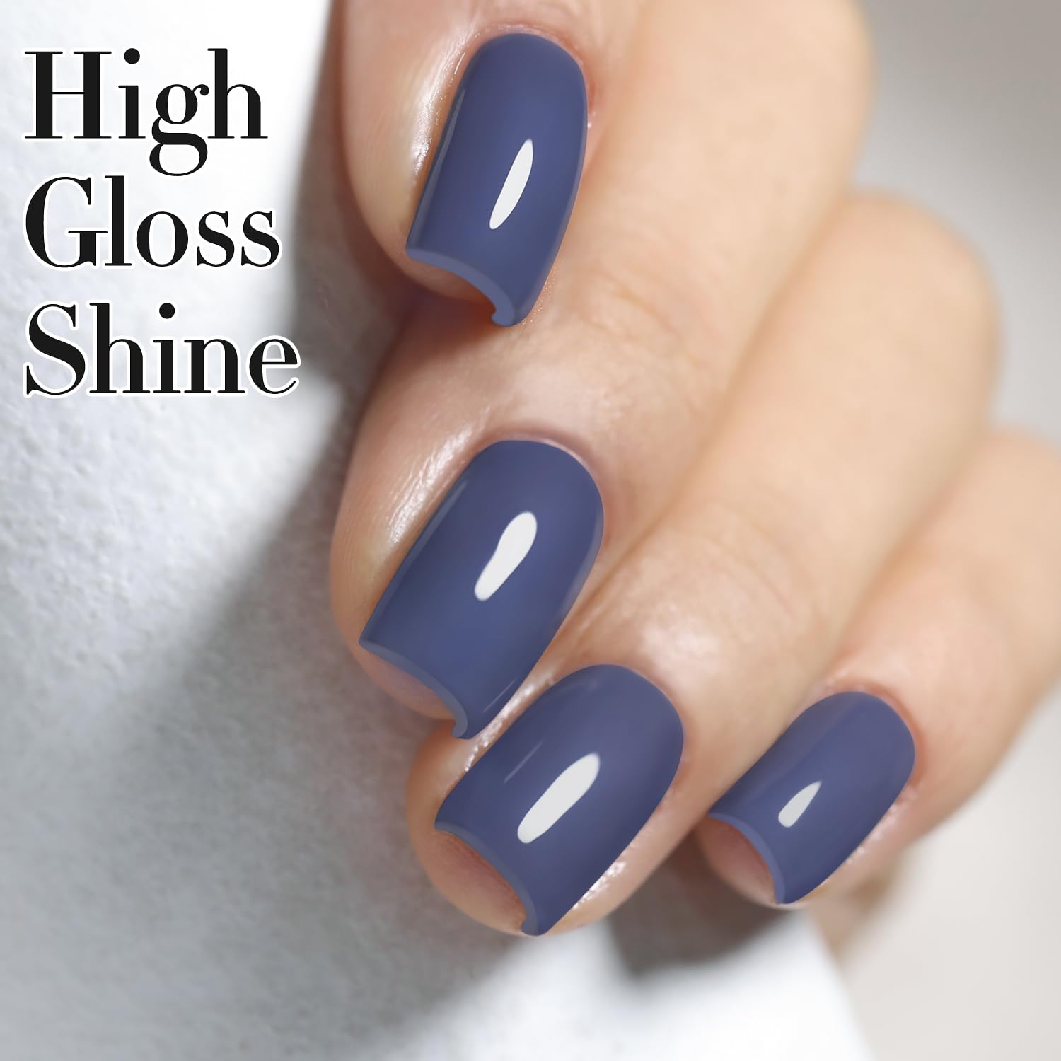 Top coat gloss delivers a lasting shine on Deep Blue Gray nails