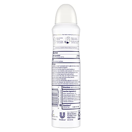 Dove Advanced Care Caring Coconut dry spray can close-up highlighting compact design and convenience.