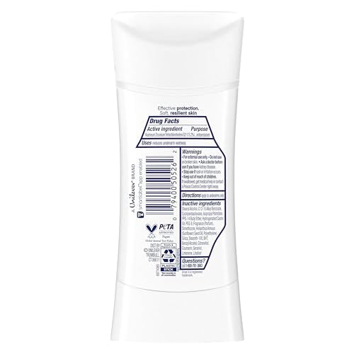 Dove Advanced Care peach and chamomile deodorant being applied to underarm.