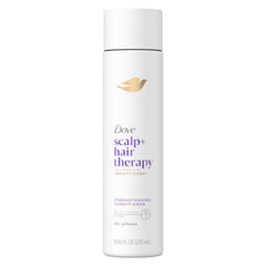 Dove Density Boost bottle pour highlights 0% sulfates and scalp nourishment.