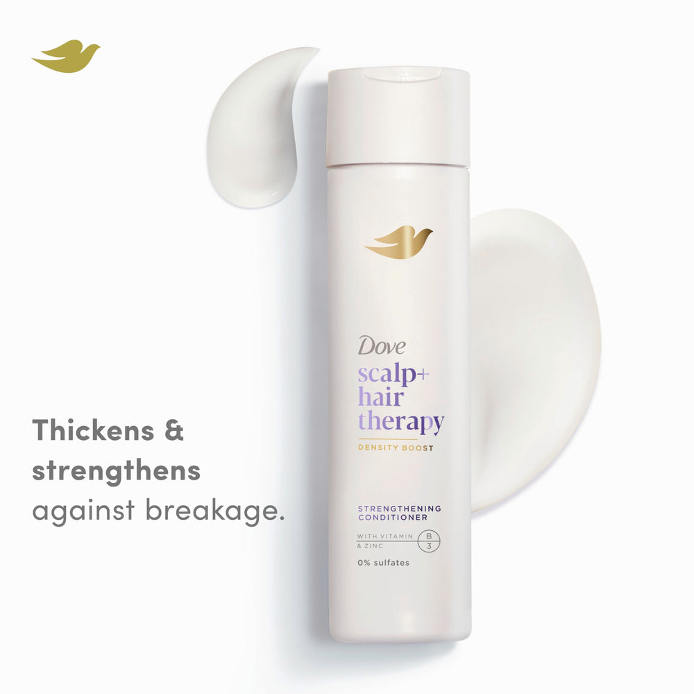 Dove Density Boost texture closeup of creamy conditioner for daily use.