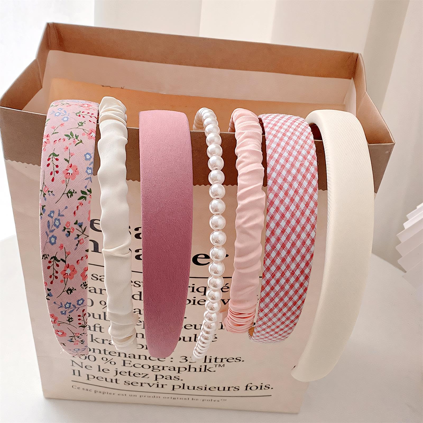 DOXISHRUKY padded pearl flower headband adds cute detail without pinching