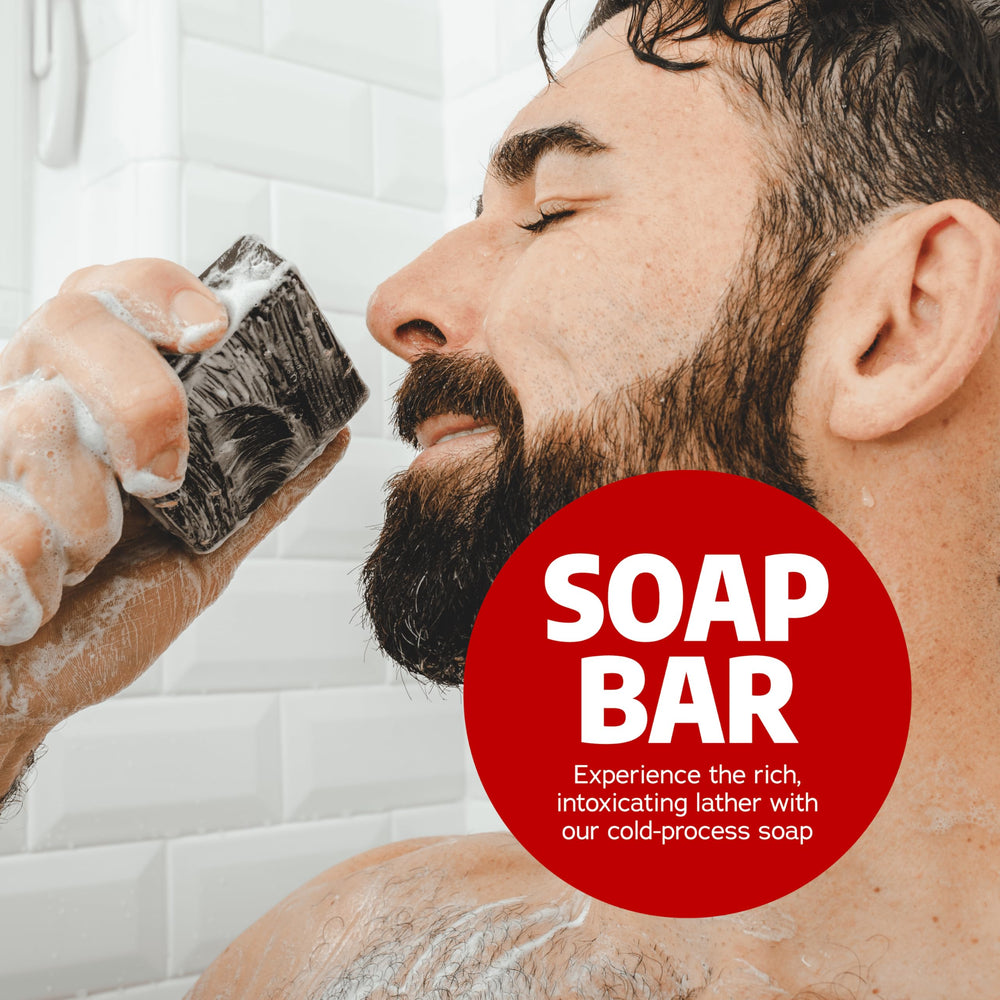 Dr. Squatch Sandalwood Summit bar shows coconut oil sheen for moisturizing wash.