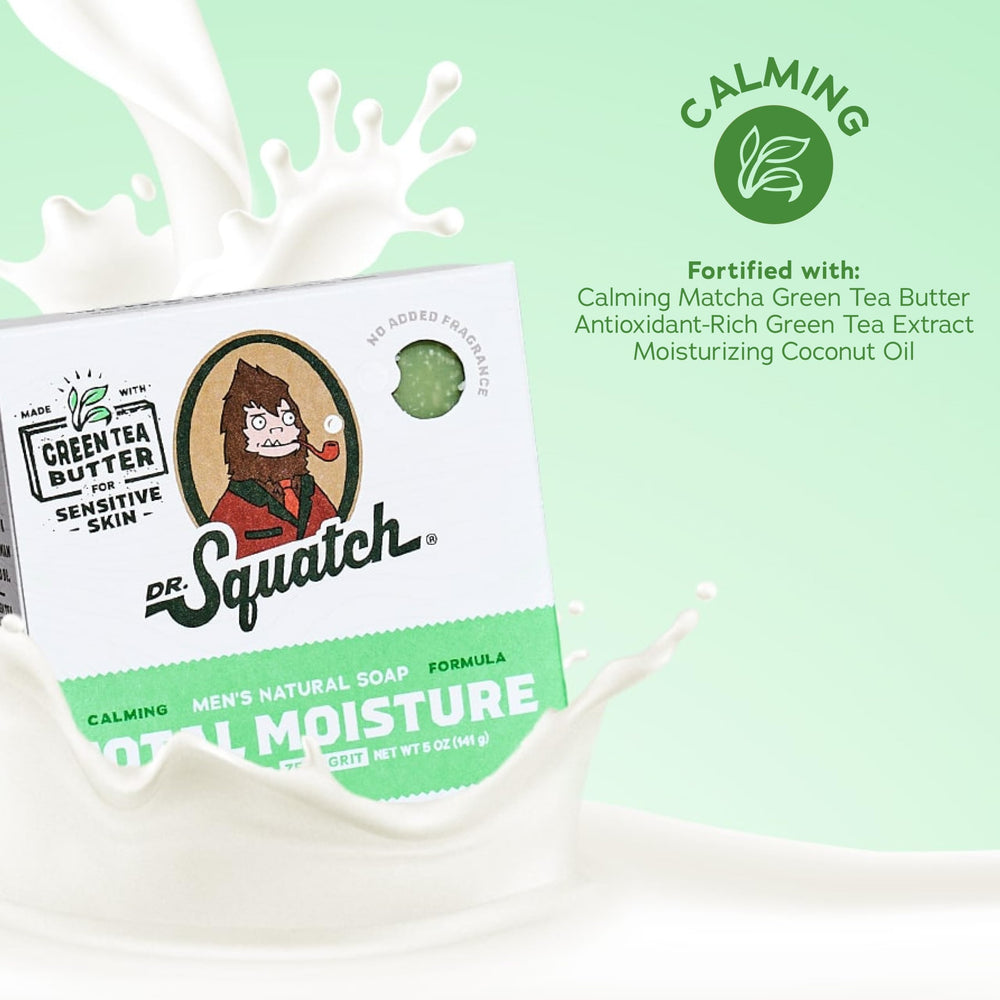 Dr. Squatch Total Moisture bar in hand creating a creamy lather.