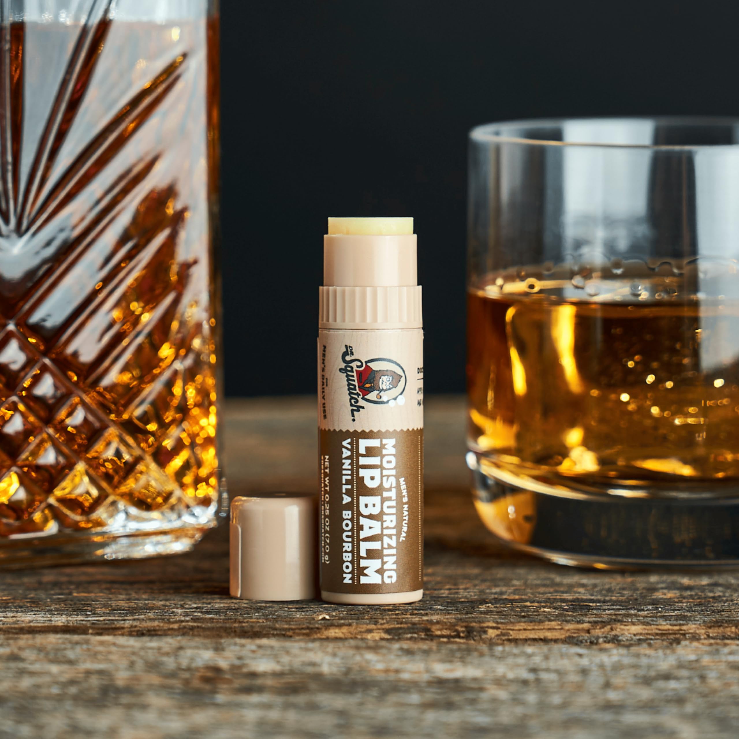 Dr Squatch Vanilla Bourbon lip balm hydrates and protects during outdoor adventures.
