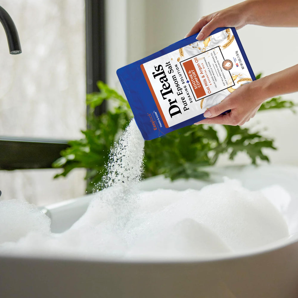 Spa-like bathroom scene with Dr Teal's product on a shelf