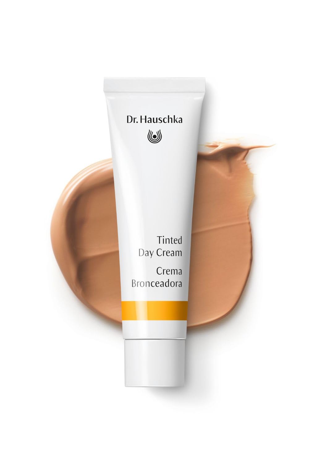 Swirl of Dr. Hauschka tinted day cream on skin for light coverage.