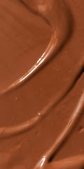 Dr. Hauschka Translucent Bronzing Tint being applied for an even blend.