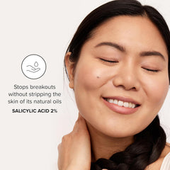 DRMTLGY Acne Cleanser foam close-up shows makeup and oil removal.