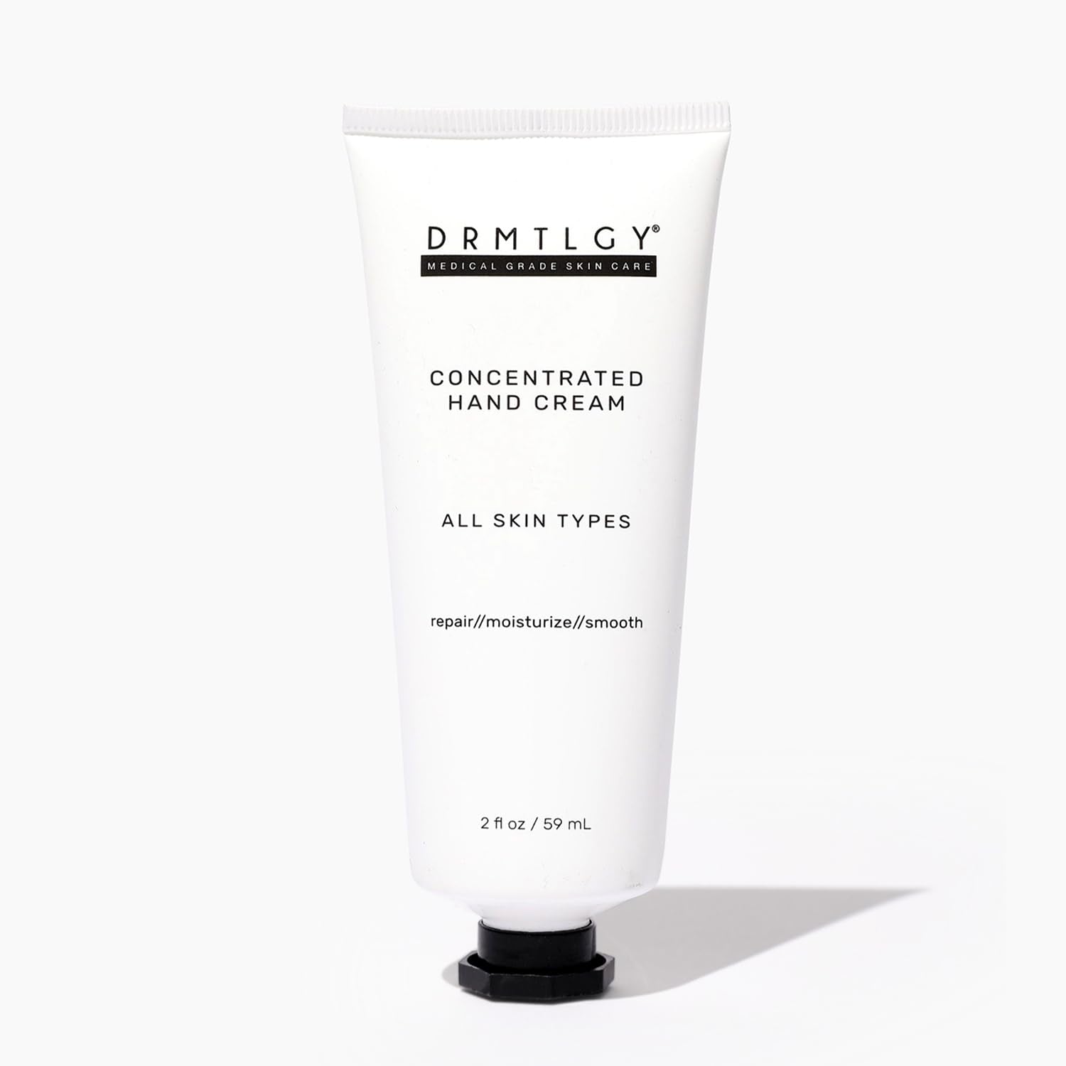 DRMTLGY crema para manos secas, empaque práctico para uso diario.