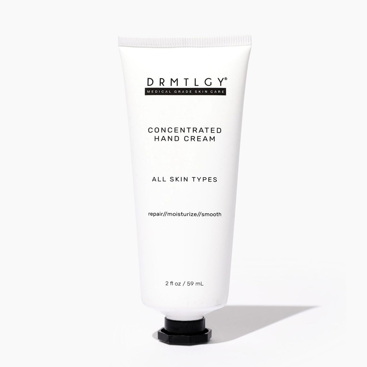 DRMTLGY crema para manos secas, empaque práctico para uso diario.