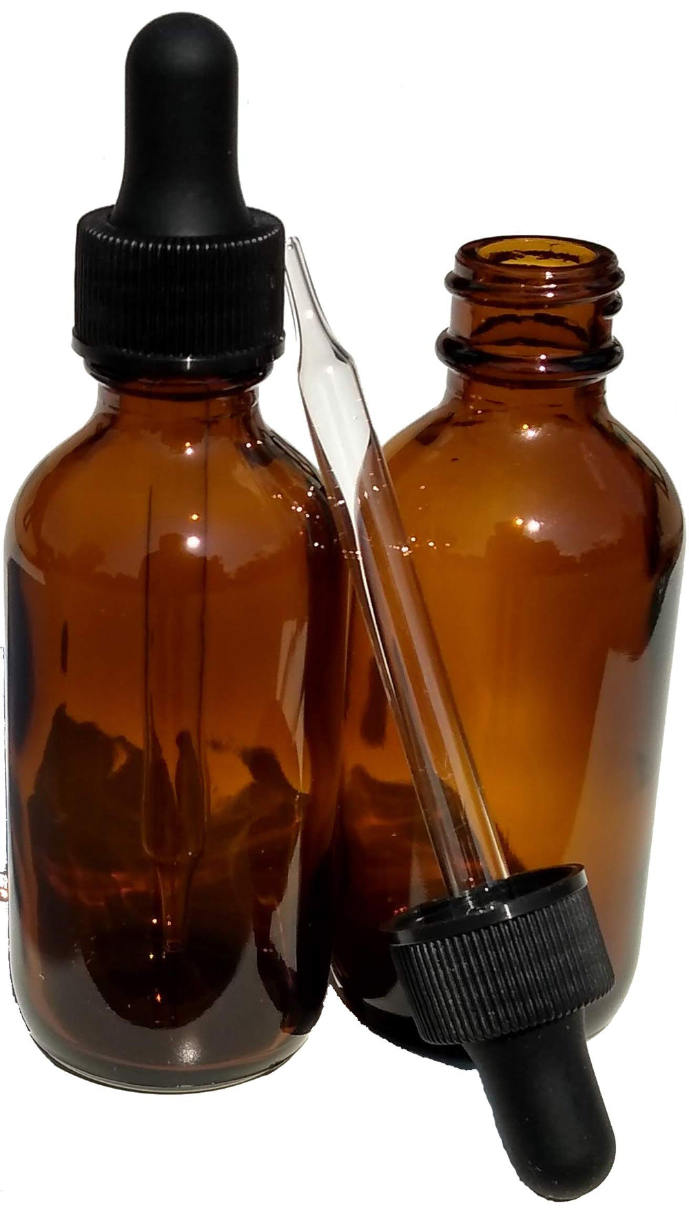 Dropper Stop 2oz amber glass bottle with dropper protects essential oils from UV light.