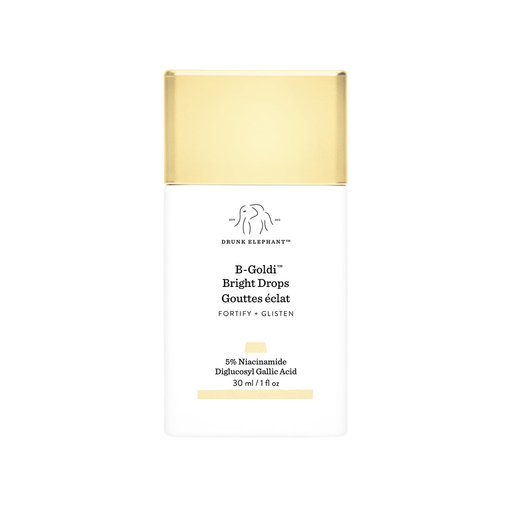 Drunk Elephant B-Goldi Bright Drops bottle-pour reveals a luminous golden finish for even tone.