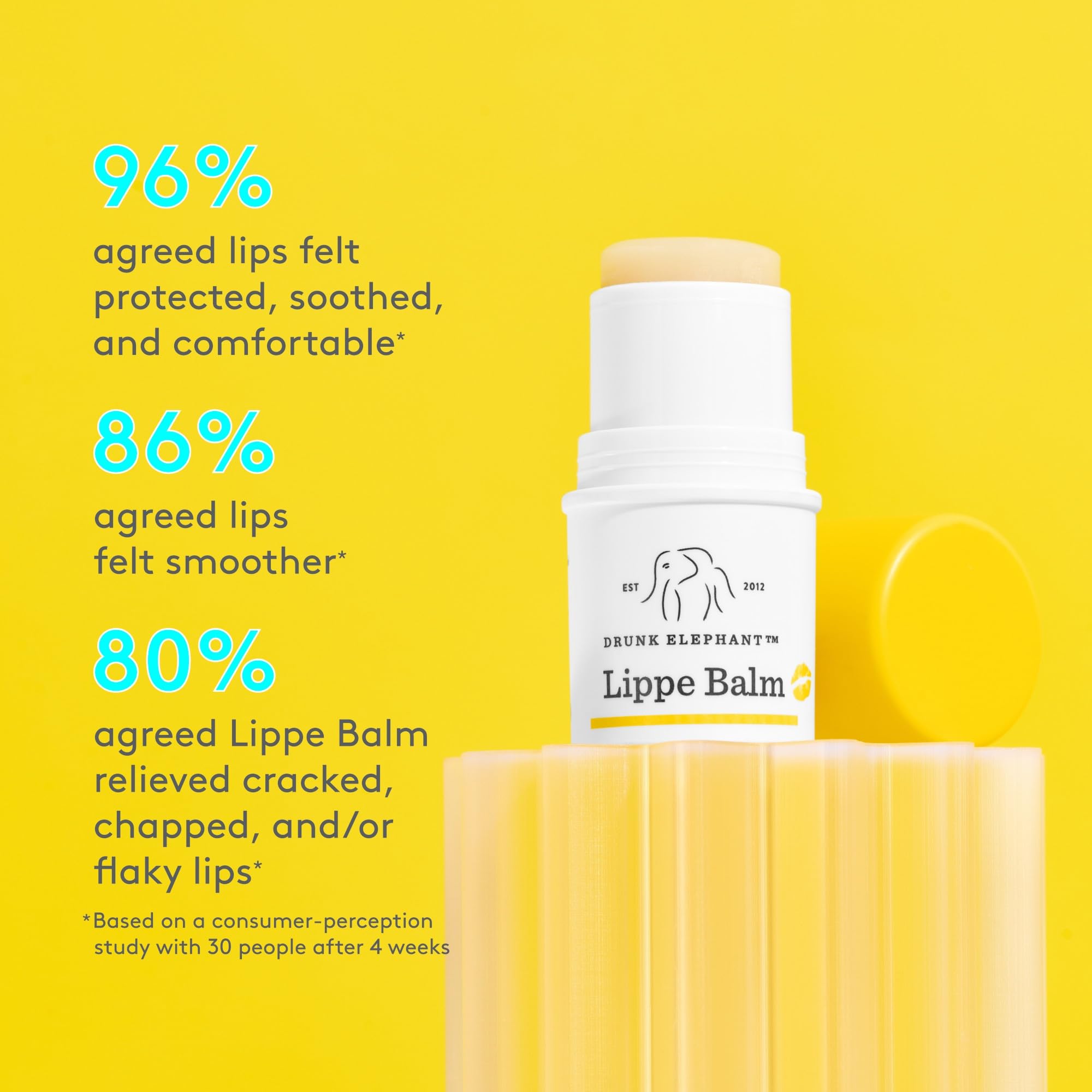 Aplicación suave de Drunk Elephant Lippe Balm para hidratación instantánea.