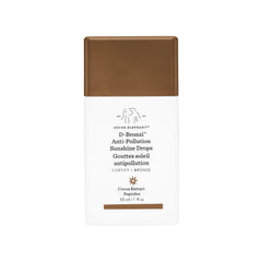 Drunk Elephant D-Bronzi Sunshine Drops bottle showing a bronze glow for sun-kissed complexion