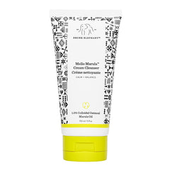 Drunk Elephant Mello Marula Cream Cleanser jar closeup shows creamy texture for gentle cleansing.