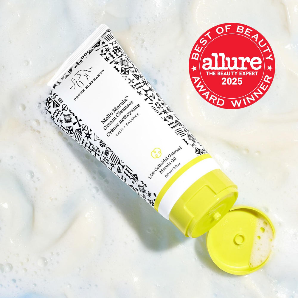 Drunk Elephant Mello Marula Cream Cleanser jar texture swipe reveals smooth, hydrating feel.