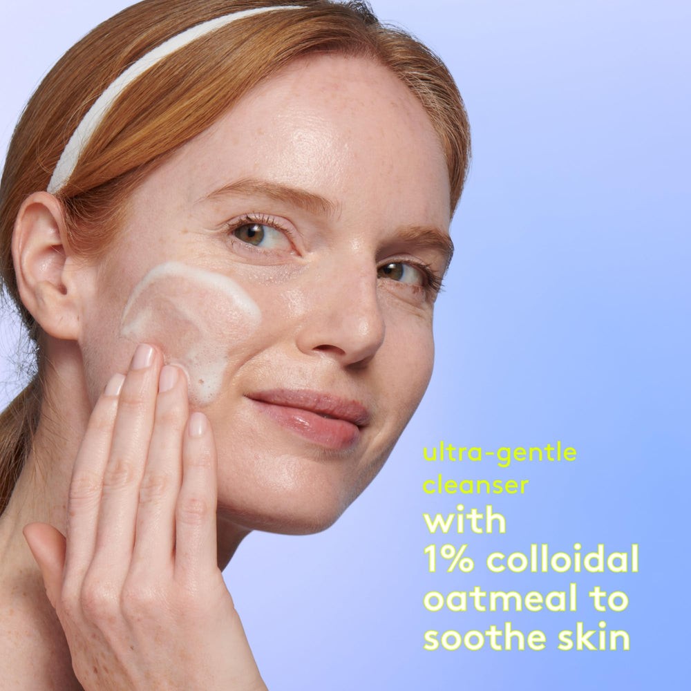 Drunk Elephant Mello Marula Cream Cleanser lid open over hands suggests easy application.