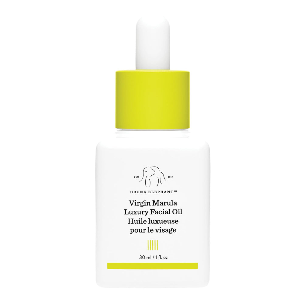 Drunk Elephant Virgin Marula Oil bottle pour showing quick hydration for balanced skin.