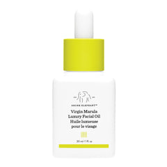 Drunk Elephant Virgin Marula Oil bottle pour showing quick hydration for balanced skin.