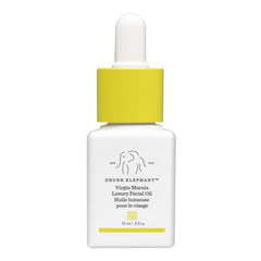 Drunk Elephant Virgin Marula Oil bottle showing nourishing glow for all skin types.