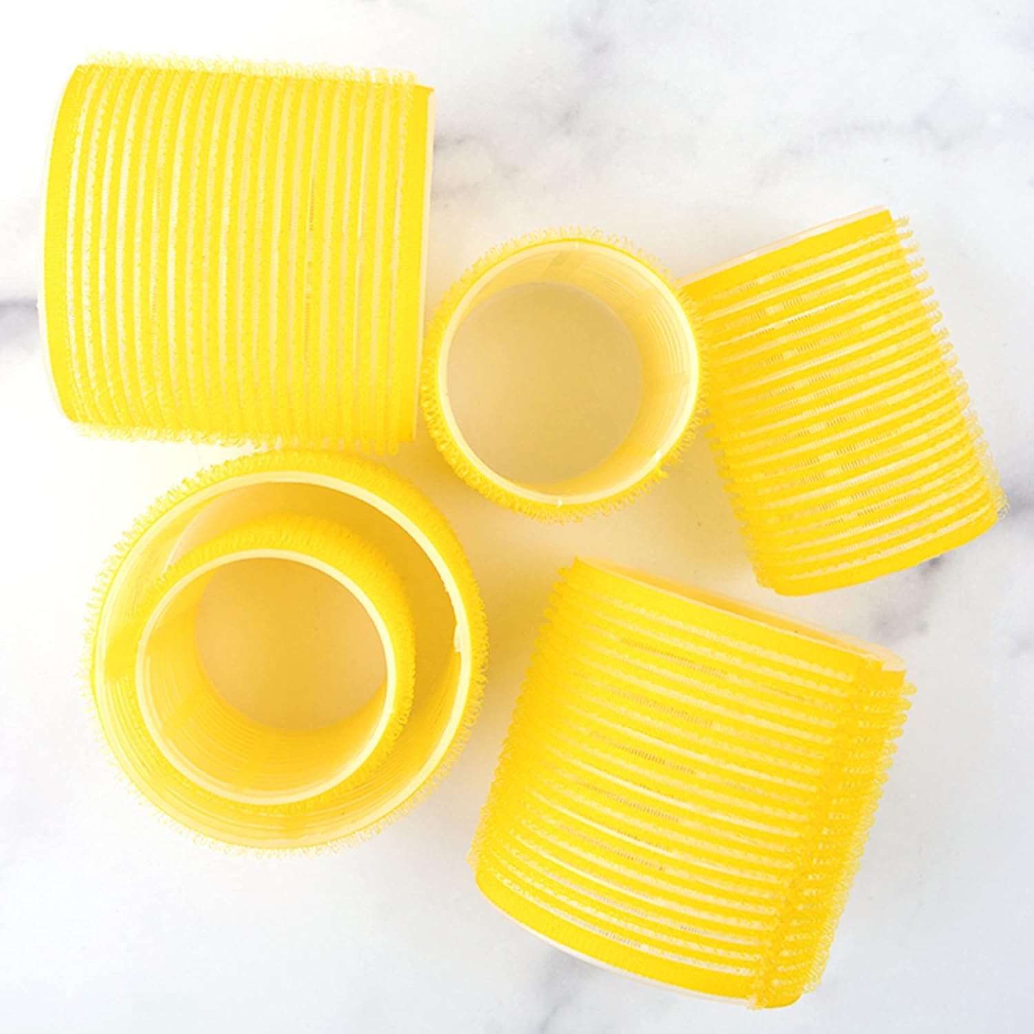 Drybar High Tops Self-Grip Rollers remove gently without pulling.